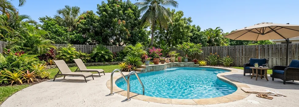 In-ground backyard swimming pool